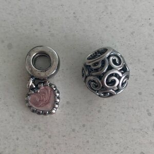 Two Retired Pandora Charms